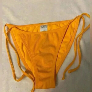 Wild Fable Women’s Ribbed side ties scoop front high leg in orange. Size small